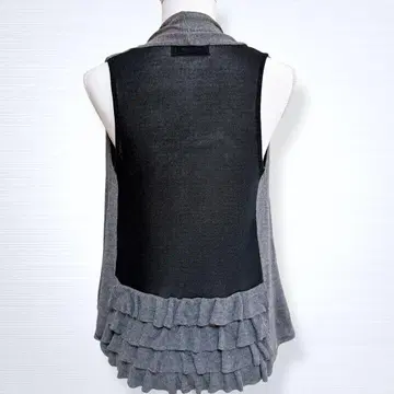 GRAND TABLE 울 혼방 이소재 도킹 메쉬 프릴 겉옷