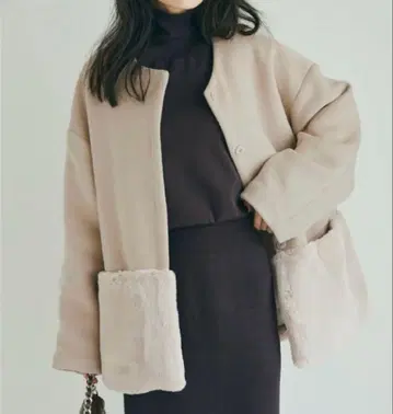 베이스먼트 온라인 밑단 퍼 노카라 코트