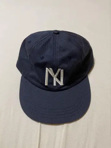 NY cap