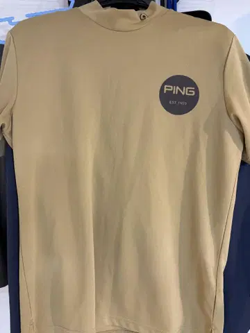 PING 베이지 그래픽 셔츠