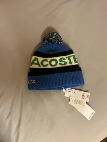 LACOSTE 폼폼 포함 니트 모자