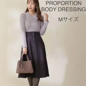 PROPORTION BODY DRESSING 라메 트위드 플레어 스커트