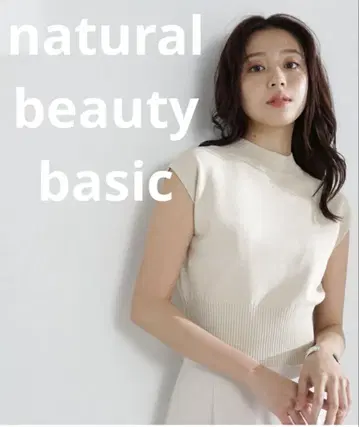 NATURAL BEAUTY BASIC 허리 마크 슬리브리스 니트