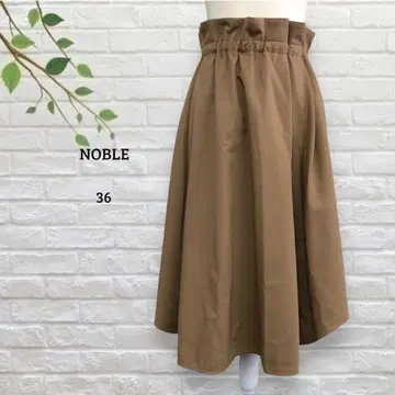 노블 NOBLE 플레어헴 스커트 미디 기장 울 혼방 가을/겨울