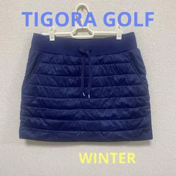 TIGORA 네이비 퀼팅 스커트