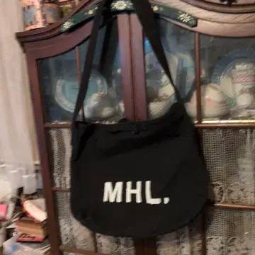 MHL. 숄더백 블랙 로고 토트백으로도 사용 가능한 두꺼운 원단