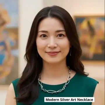 CUSHKA 쿠슈카 실버 컬러 아트 목걸이