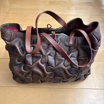 앙리 쿠이 브라운 가죽 토트백