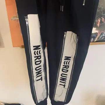 Nerd Unit 리플렉터 조거 팬츠 블랙