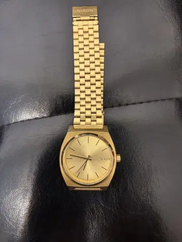 NIXON THE TIME TELLER 골드 손목시계