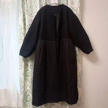이소재 절개 노카라 코트 퀼팅 롱 코트
