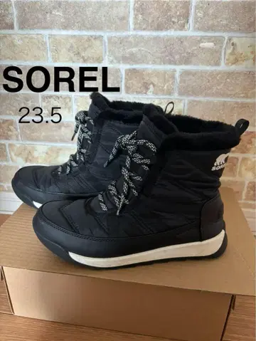 SOREL 퍼 포함 블랙 부츠