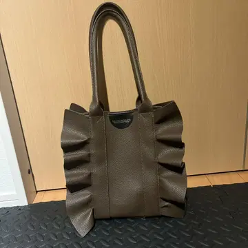극장 프로덕츠 프릴 토트백 브라운