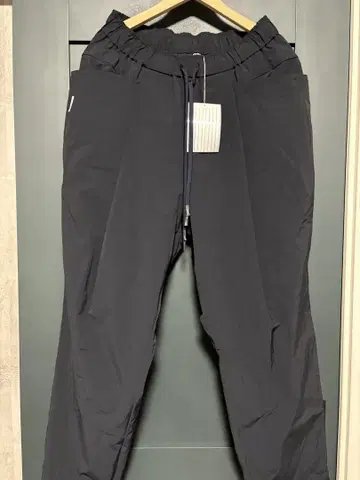 S.F.C WIDE TAPERED EASY PANTS (NYLON)