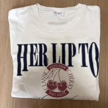 Her lip to classic cherry tee