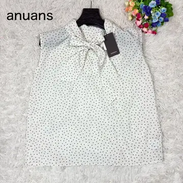 [ 새상품급 ] anuans 화이트 도트 슬리브리스 블라우스 보타이 리본