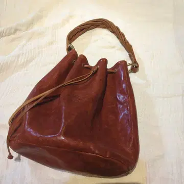 IL BISONTE 브라운 가죽 복조리백