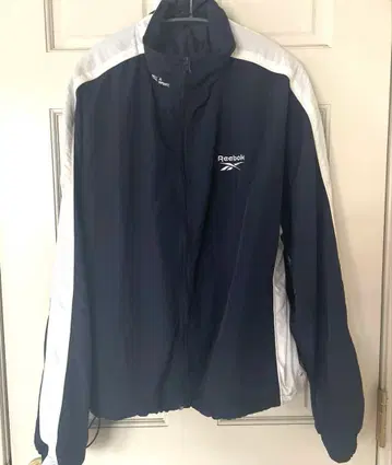 Reebok 네이비 별주 스몰 벡터 자수 밑단 드로스트 나일론 자켓 M