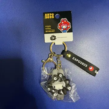 오사카 간사이 엑스포 미야쿠미야쿠 산리오 키링 블랙 변신 마이멜로디