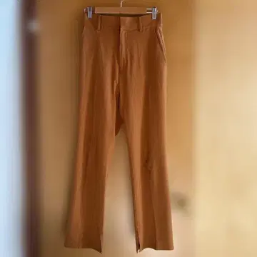 오렌지 슬랙스 백 포켓 부착