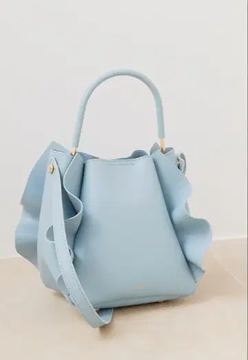 CELFORD 원핸들 프릴 백 라이트 블루