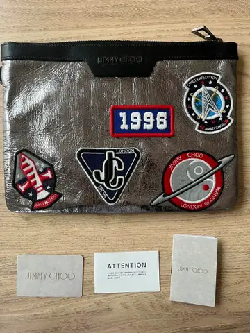 새상품 JIMMY CHOO 지미추 데릭 와펜 클러치백