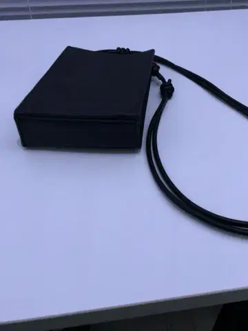 Square leather shoulder bag UNITED TOKYO
