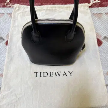 TIDEWAY 블랙 가죽 핸드백