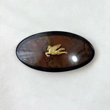ETRO 타원형 머리 장식