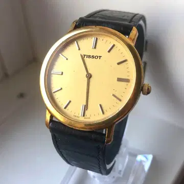 TISSOT 티쏘 오벌 골드 케이스 아날로그 손목시계
