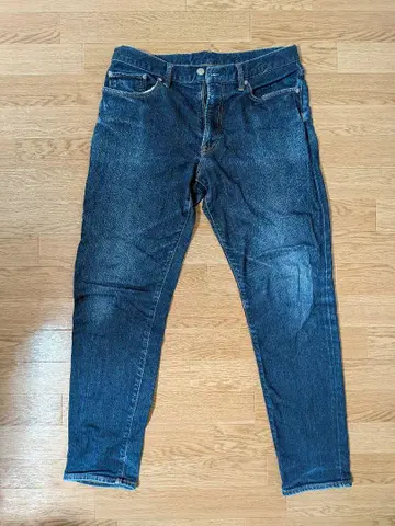 GU 다크 블루 슬림 핏 데님 팬츠