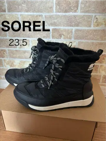 SOREL 퍼 포함 블랙 부츠