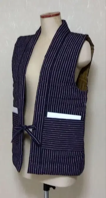 면 누빔 소매 없는 반텡
