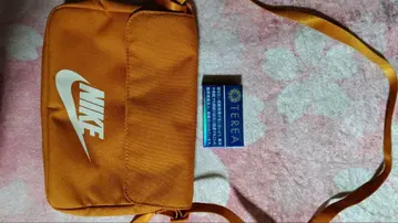 NIKE 오렌지 숄더백