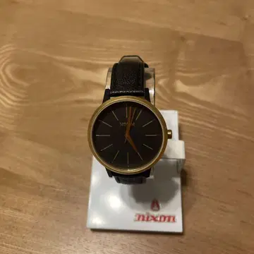 NIXON 블랙 골드 아날로그 손목시계