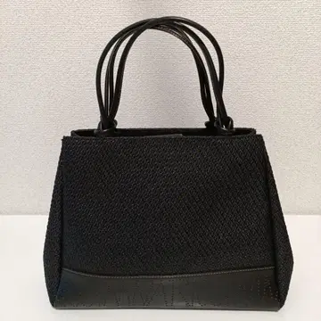 NINA RICCI 블랙 뜨개질 핸드백