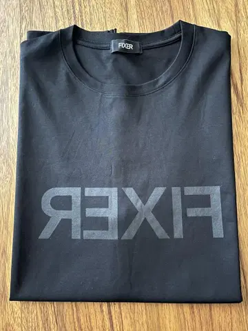 FIXER 리버스 프린트 슬리브리스 T셔츠 ALLBLACK