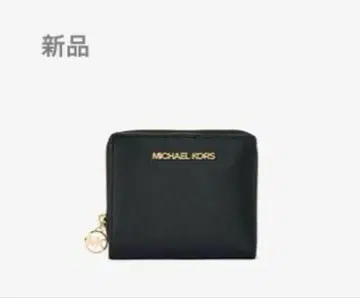 마이클코어스 JET SET TRAVEL 지퍼 참 지갑