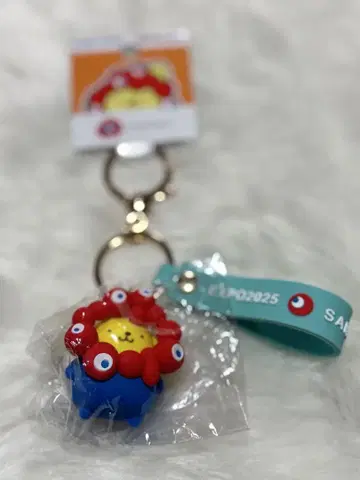 오사카 만박 미야쿠미야쿠 산리오 키링 폼폼푸딩