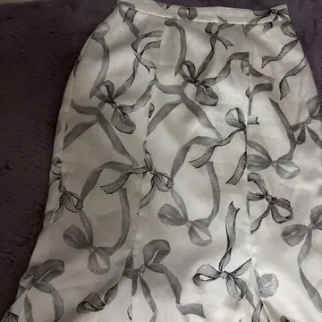 [스나이델] 리본 프린트 머메이드 스커트