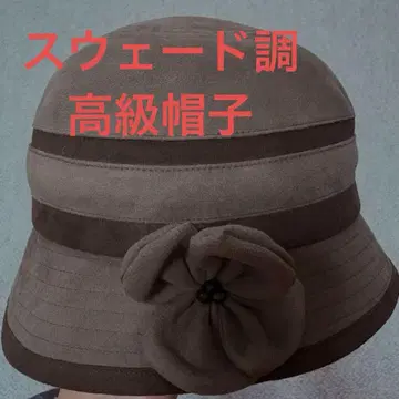 브라운 스웨이드풍 버킷햇 플라워 장식 포함