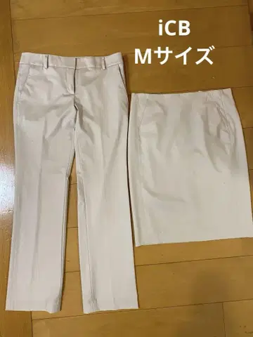 크림색 슬랙스와 스커트 세트