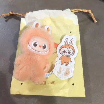 오렌지 컬러 봉제 인형과 스티커 세트