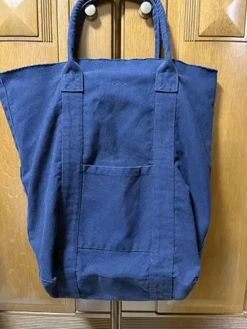 론 허먼 네이비 토트백 내 포켓 부착