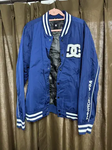 DC 바시티 자켓