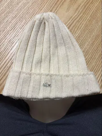 LACOSTE 크림색 니트 모자