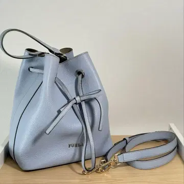 FURLA 라이트 블루 복조리형 숄더백