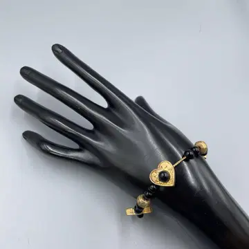 238 빈티지 하트와 크로스 모티브의 팔찌