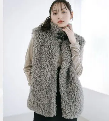 코코딜 컬리 퍼 베스트