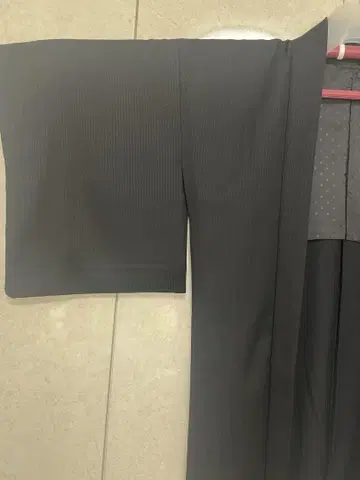 10월 10일까지 게재 예정인 롱 기장 줄무늬 울 겉옷